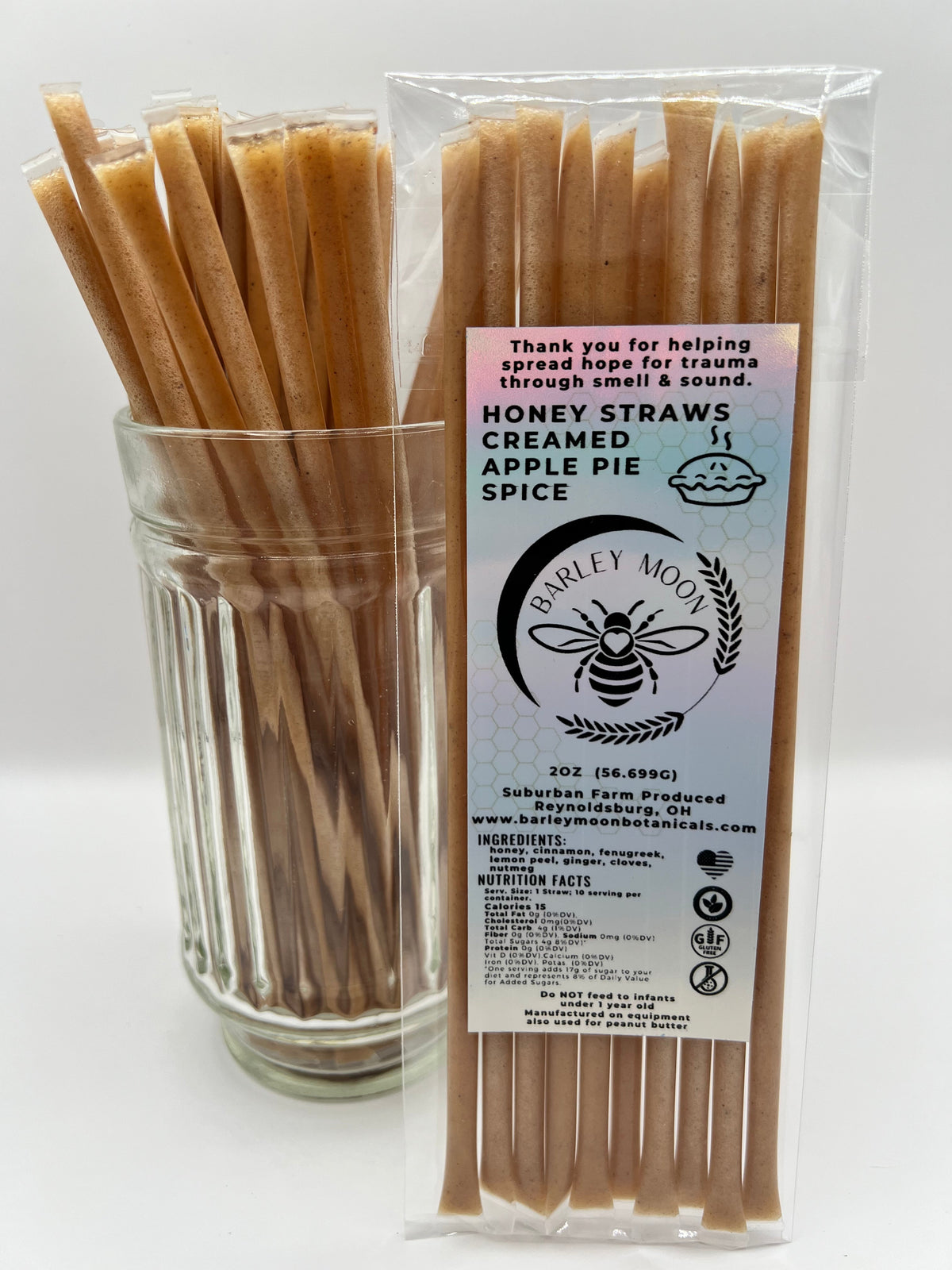 Barley Moon Botanicals Apple of My Hive creamed honey straws infused with apple pie spices in a clear plastic pack.