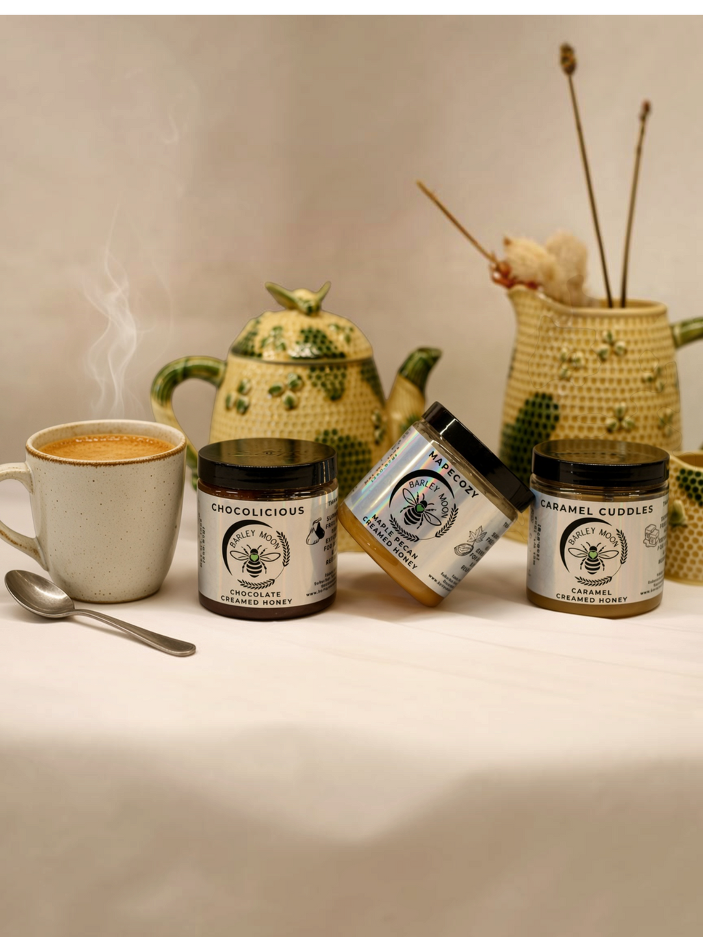 Barley Moon Botanicals Coffee Lover Bundle featuring three jars of creamed honey with coffee and a teapot