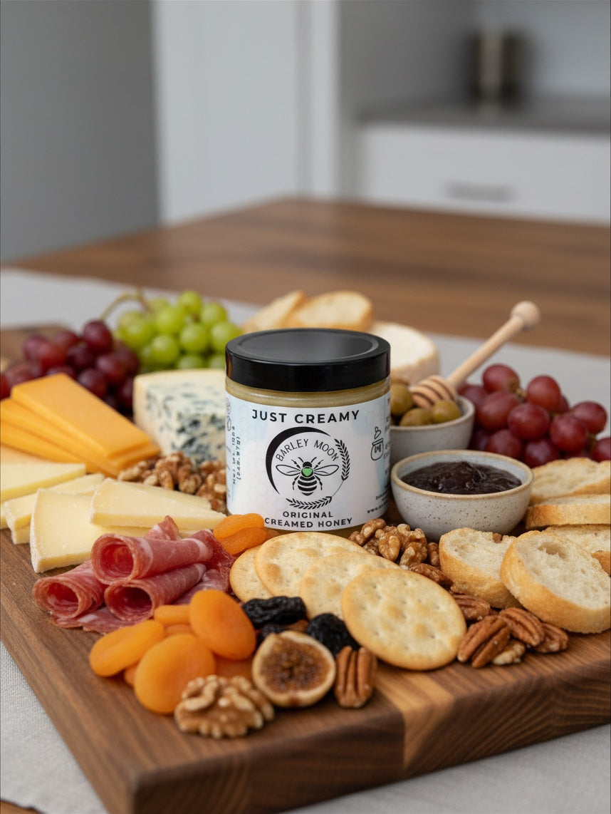 Barley Moon Botanicals Tea Lover Bundle featuring creamed honey jars, a honey bear, and lemon ginger honey straws.