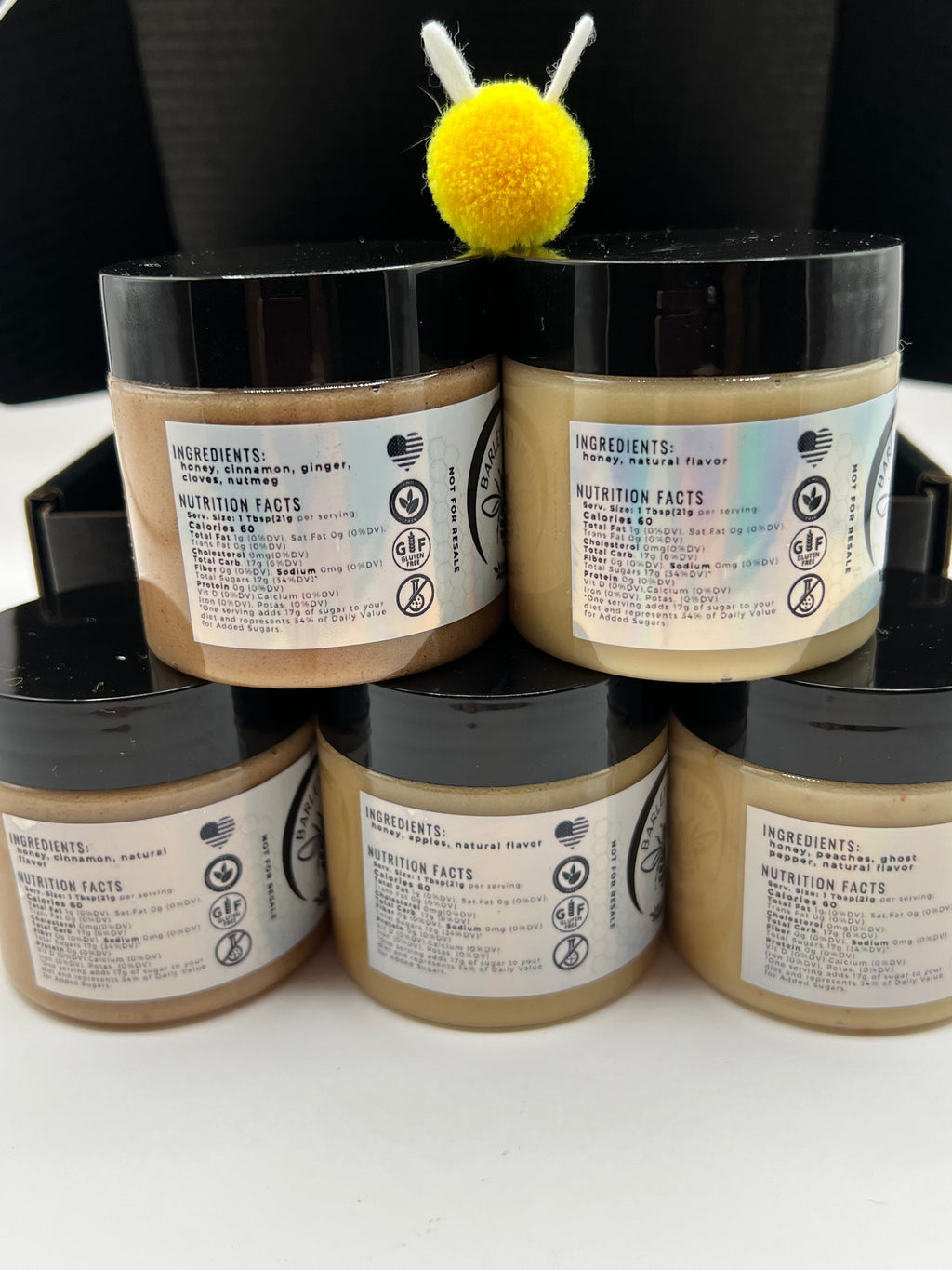 Barley Moon Botanicals Autumn Indulgence creamed honey flight featuring five jars with nutrition labels and a bee topper