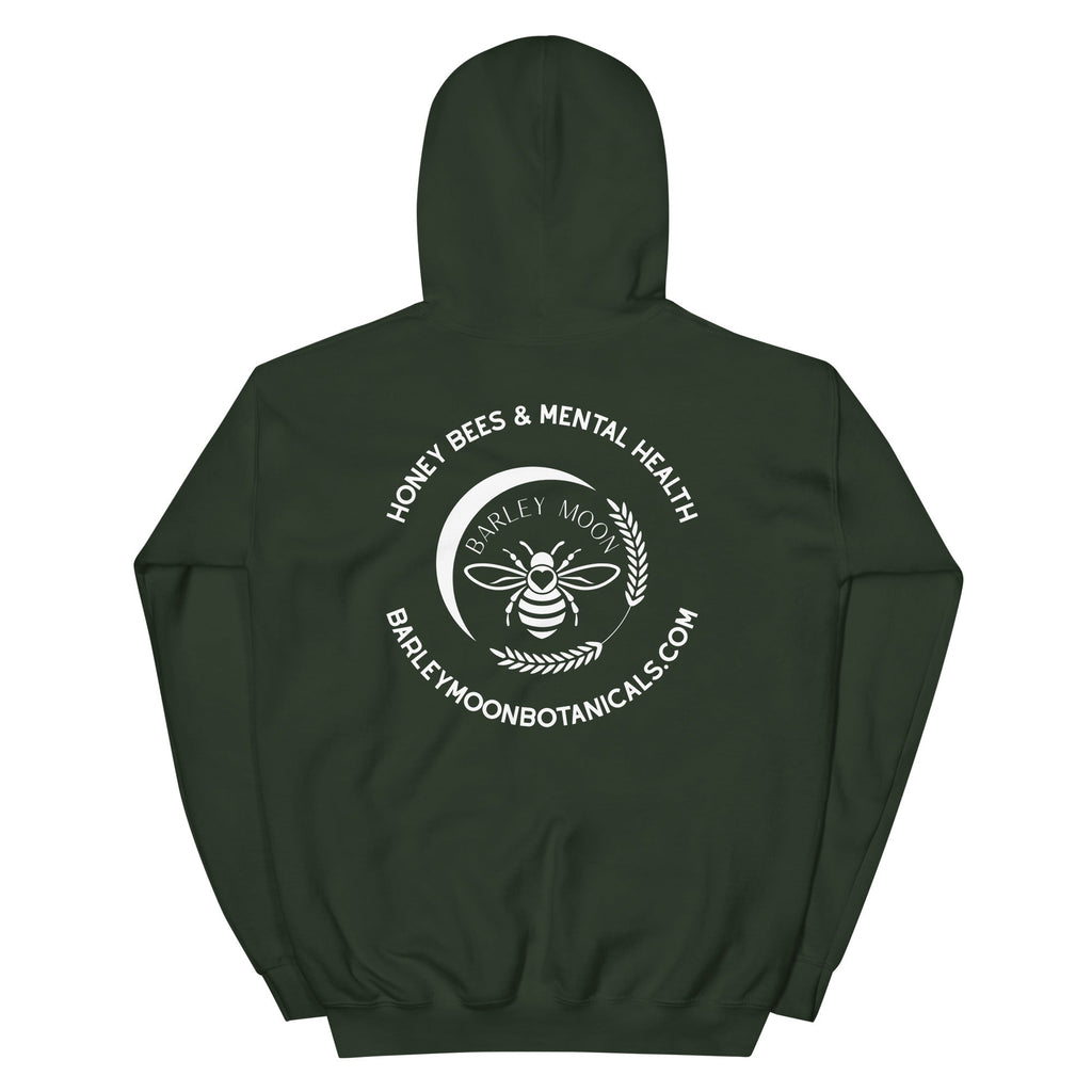 Back view of a dark green Barley Moon Botanicals unisex hoodie featuring a white bee and crescent moon logo graphic.