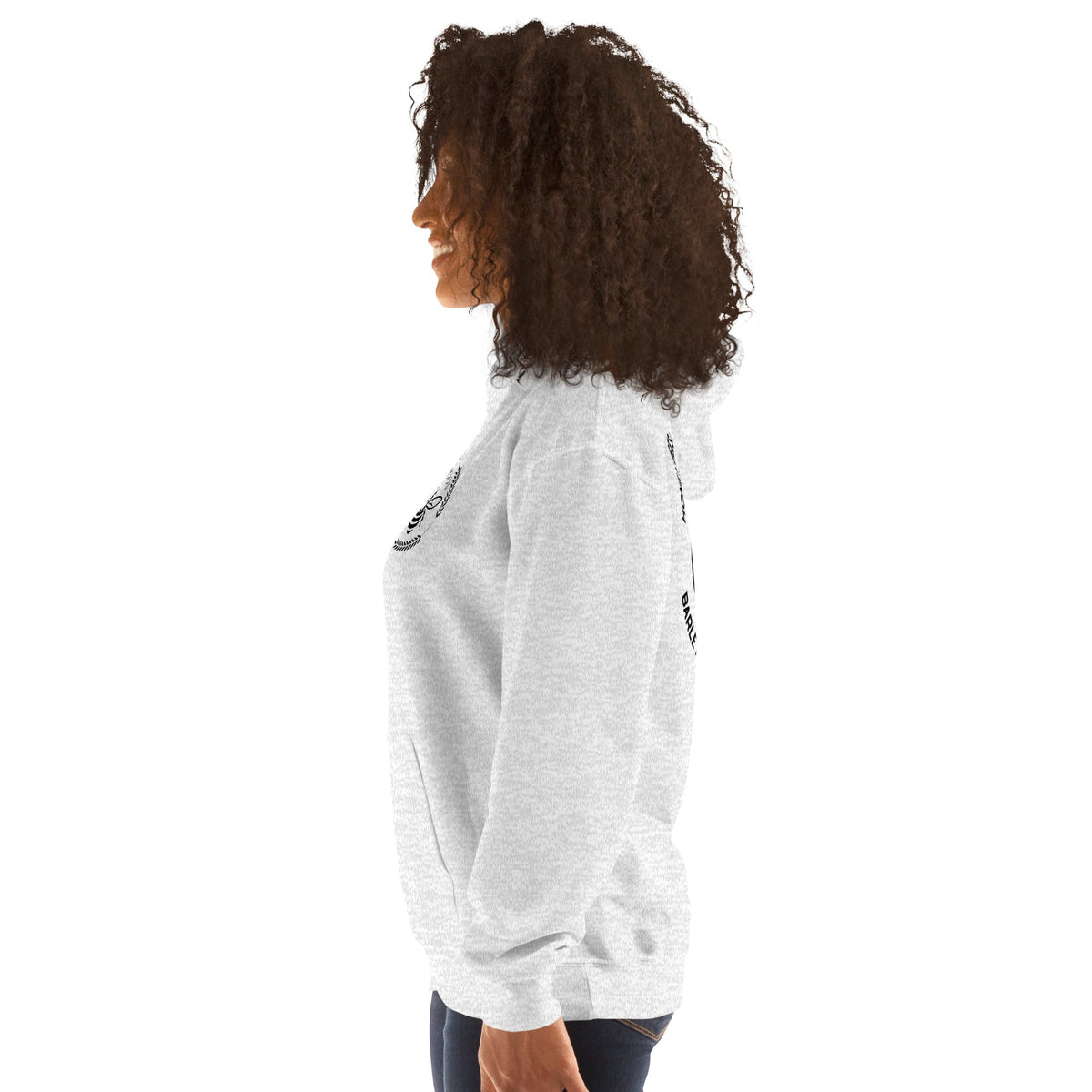Barley Moon Botanicals unisex hoodie in light grey with bee and crescent moon logo, worn by a woman in profile.