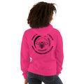Woman wearing a bright pink Barley Moon Botanicals unisex hoodie with a black bee and moon logo on the back