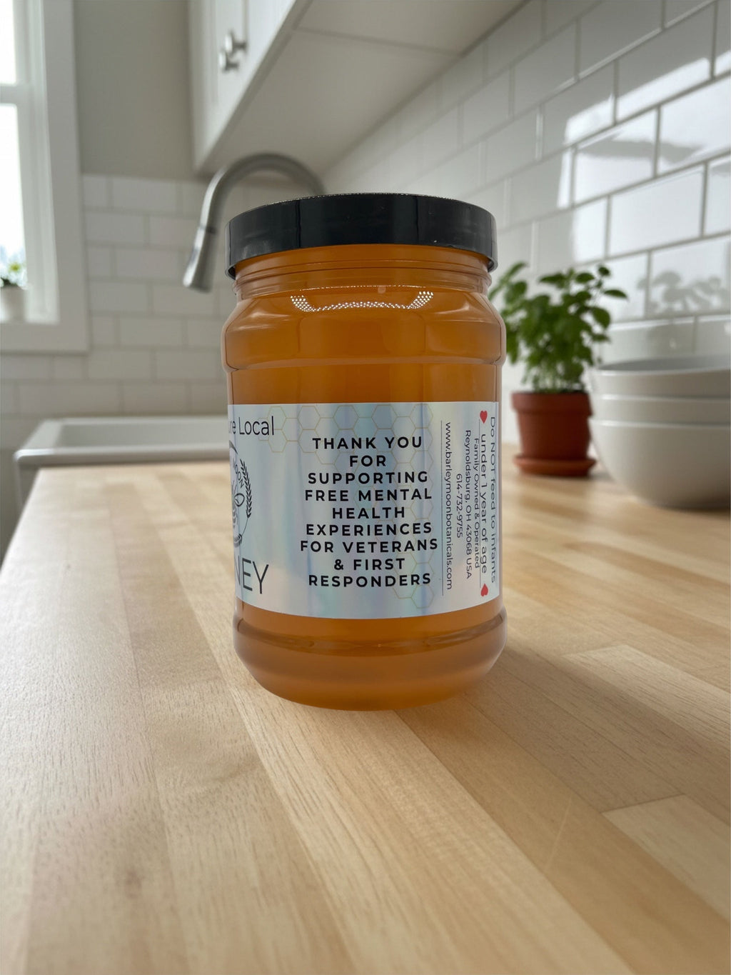 Barley Moon Botanicals 3lb jar of raw, unfiltered local honey with a label supporting veteran mental health events.